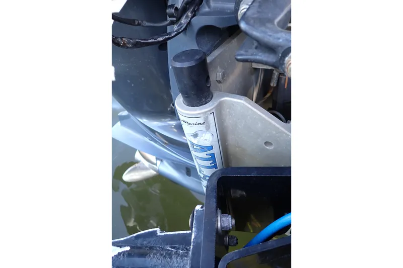 Slide: The Image of Close-up of a 2015 Blue Wave 2400 PureBay boat engine component. - 94
