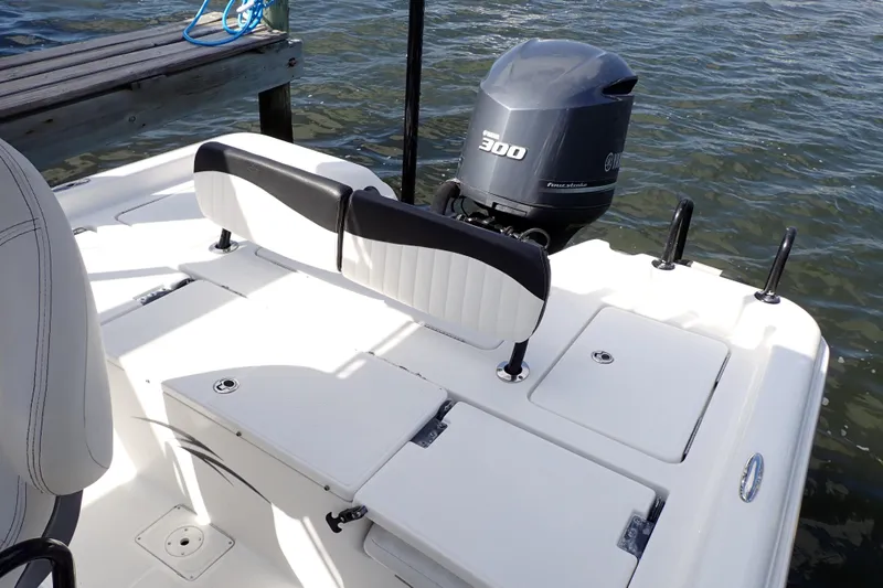 Slide: The Image of 2015 Blue Wave 2400 PureBay boat with Yamaha 300 outboard motor on water. - 15