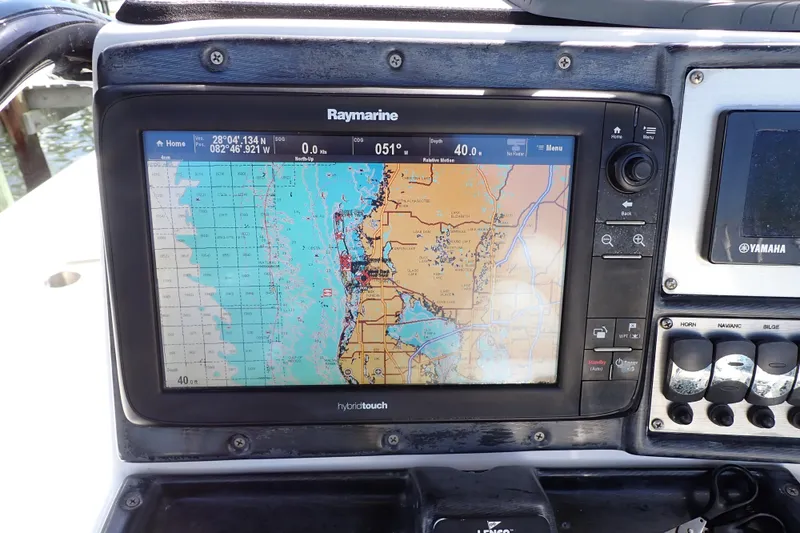 Slide: The Image of Raymarine GPS display on 2015 Blue Wave 2400 PureBay boat, showing nautical chart. - 23