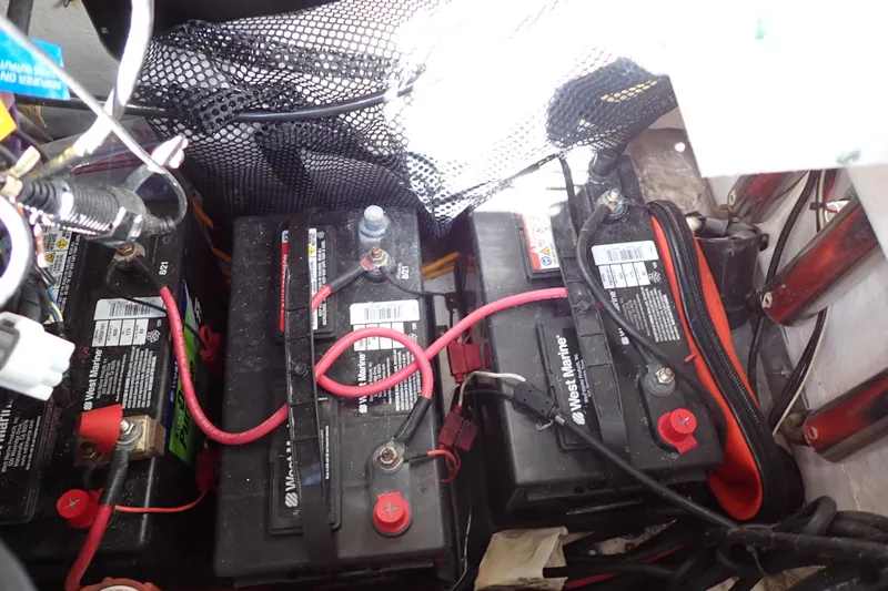 Slide: The Image of Batteries and wiring inside a 2015 Blue Wave 2400 PureBay boat. - 37