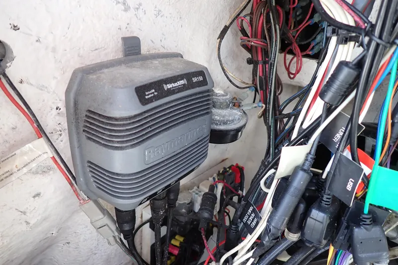 Slide: The Image of Raymarine SiriusXM SR150 module with wiring in a 2015 Blue Wave 2400 PureBay boat. - 36