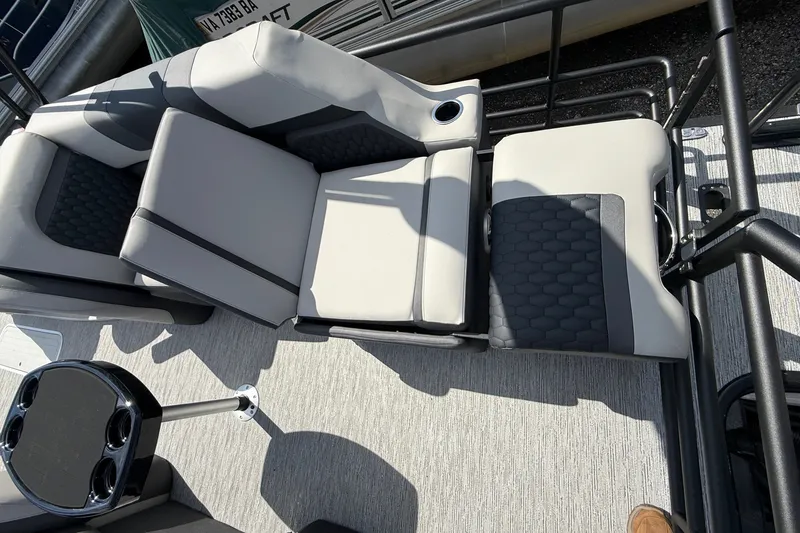 Slide: The Image of Luxurious seating on 2026 Sylvan L-3 LZ DH pontoon boat with cup holder and table. - 22