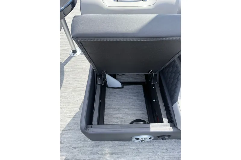 Slide: The Image of Open storage compartment in 2026 Sylvan L-3 LZ DH boat, showcasing interior design. - 21