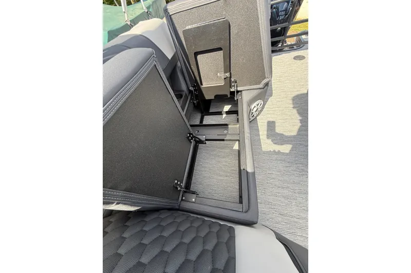 Slide: The Image of 2026 Sylvan L-3 LZ DH boat interior with open storage compartment. - 23