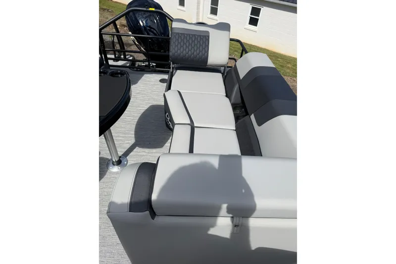 Slide: The Image of 2026 Sylvan L-3 LZ DH pontoon boat with gray seating and black accents. - 14