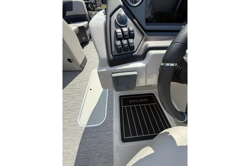 Slide: The Image of Interior view of 2026 Sylvan L-3 LZ DH boat dashboard and steering wheel. - 26