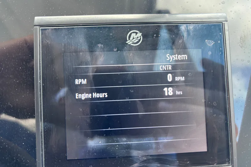 Slide: The Image of Display screen showing 2025 Beneteau Antares 8 engine hours at 18, RPM at 0. - 27