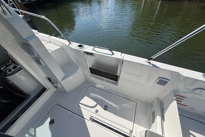 Slide: The Image of 2025 Beneteau Antares 8 boat deck with water view, featuring sleek design and modern amenities. - 31