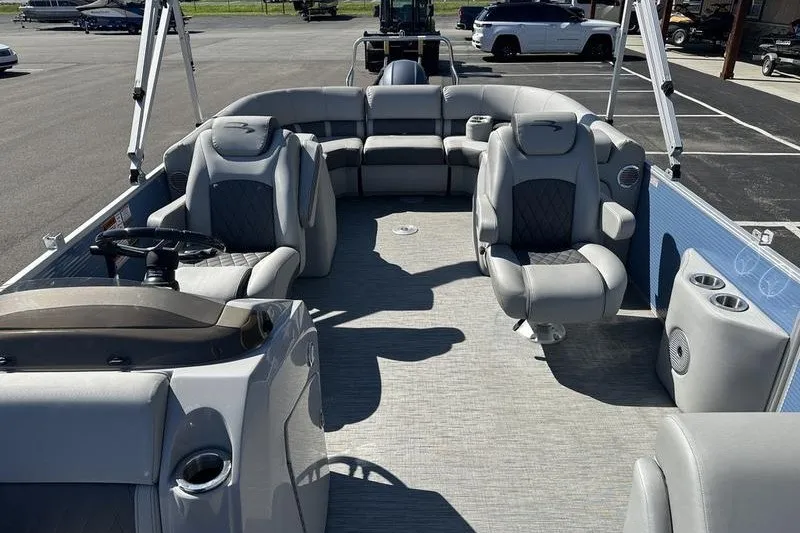 Slide: The Image of 2022 Bennington 23 LSR pontoon boat interior with luxurious seating and modern design. - 14