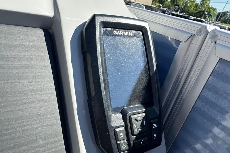 Slide: The Image of Garmin device on 2022 Bennington 23 LSR boat dashboard, close-up view. - 19