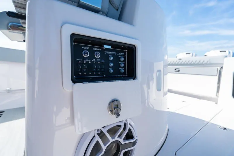Slide: The Image of 2027 Sportsman Open 232 Center Console boat control panel and speaker detail. - 35