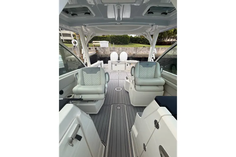 Slide: The Image of 2026 Sailfish 316 DC boat interior with luxurious seating and sleek design. - 1