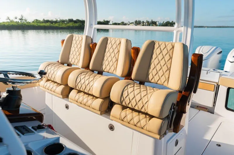 Slide: The Image of Luxurious seating on 2027 Sportsman Open 352 Center Console boat, featuring diamond-stitched upholstery. - 34