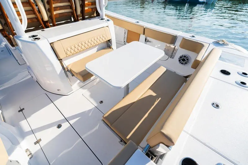 Slide: The Image of Luxurious seating area on 2027 Sportsman Open 352 Center Console boat. - 17