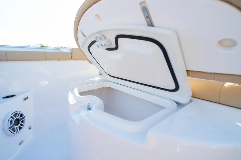 Slide: The Image of Open storage compartment on 2027 Sportsman Open 352 Center Console boat. - 46