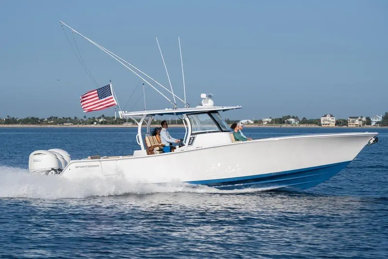 The Image of 2027 Sportsman Open 352 Center Console boat cruising on open water. - 0