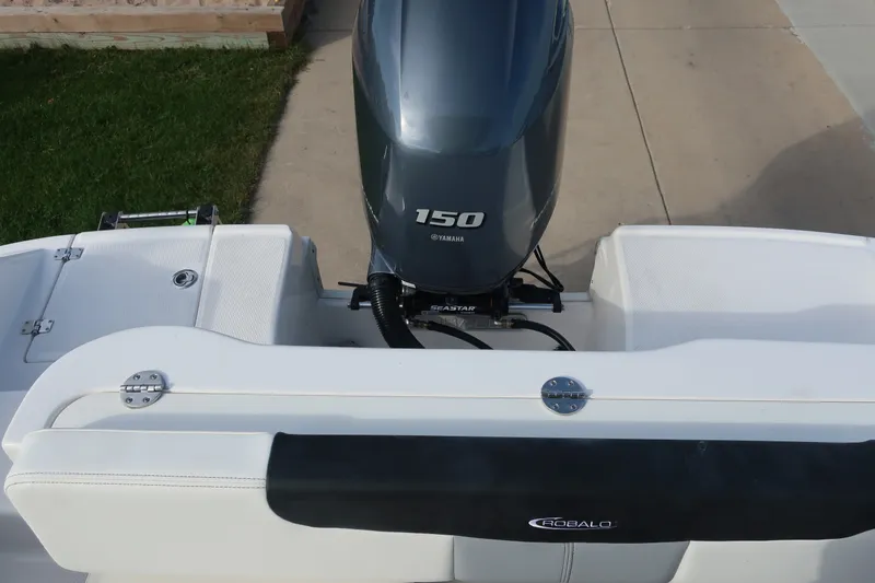 Slide: The Image of 2023 Robalo R202 Explorer boat with Yamaha 150 engine, rear view. - 27