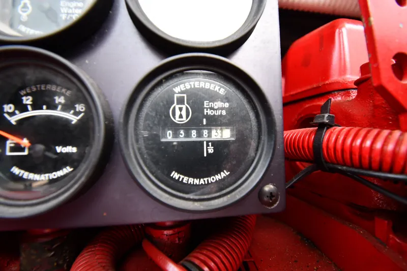 Slide: The Image of Westerbeke engine hour meter showing 388.3 hours on a 1998 Sea Ray 400 Sedan Bridge. - 63