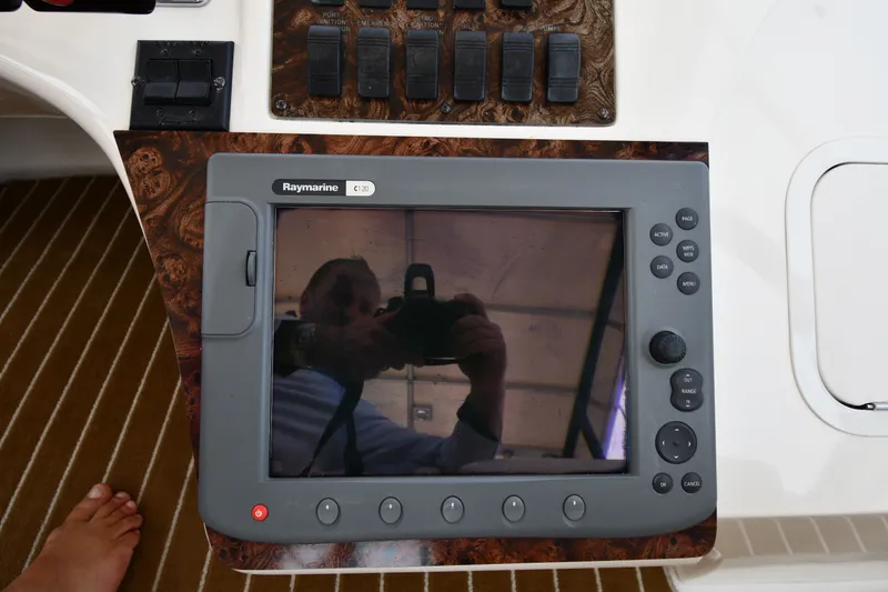Slide: The Image of Raymarine C120 display on 1998 Sea Ray 400 Sedan Bridge yacht dashboard. - 25