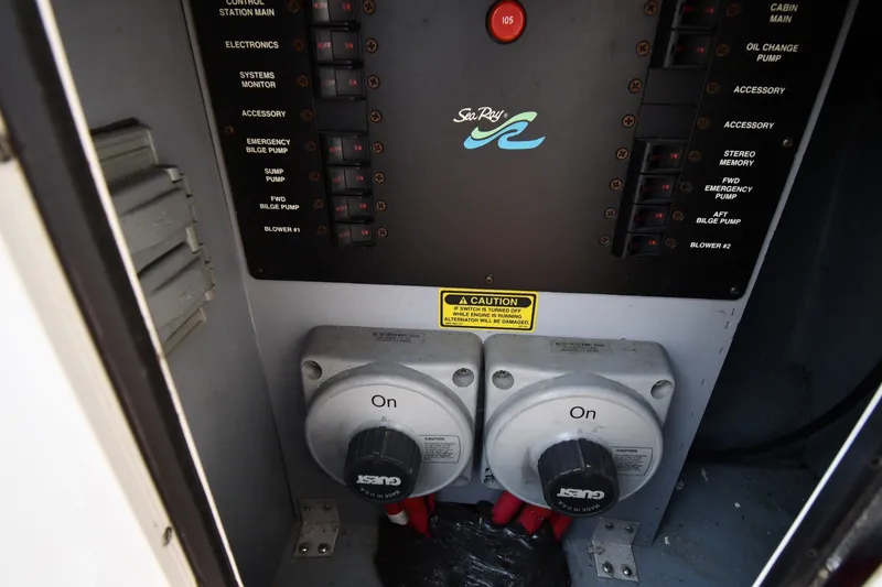 Slide: The Image of Electrical control panel of a 1998 Sea Ray 400 Sedan Bridge boat. - 15