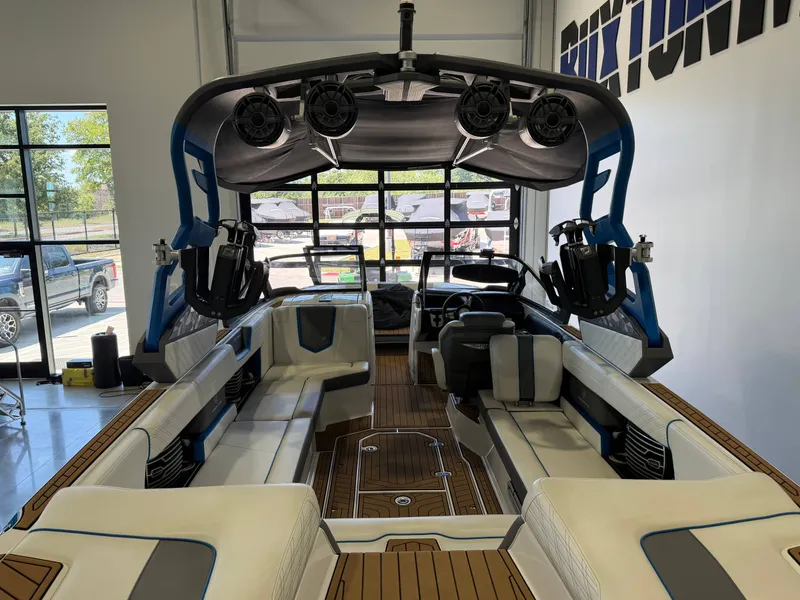 Slide: The Image of Interior of a 2019 Nautique Super Air Nautique G25 with luxurious seating and modern design. - 4