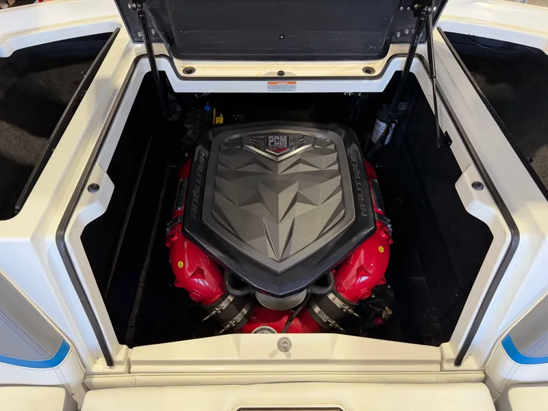 Slide: The Image of The engine compartment of a 2019 Nautique Super Air Nautique G25 with a powerful PCM engine. - 11