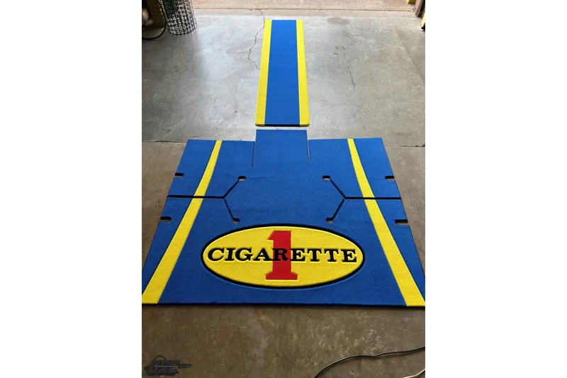 Slide: The Image of Blue and yellow boat flooring for 2005 Cigarette 39' Top Gun Unlimited. - 15