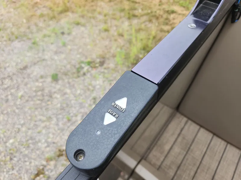 Slide: The Image of Close-up of a boat railing with volume control and pause button. - 20