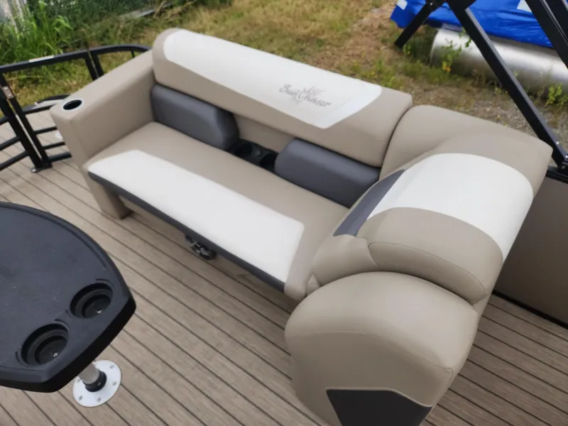 Slide: The Image of The 2023 SunChaser Eclipse 8523 LR DH features a comfortable bench seat with cup holders. - 8