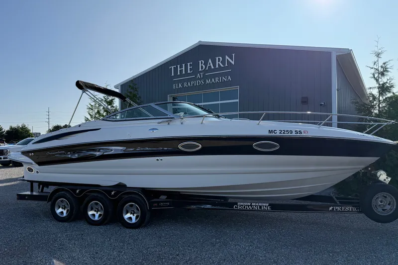 The Image of 2005 Crownline 275 CCR boat on trailer at Elk Rapids Marina. - 1