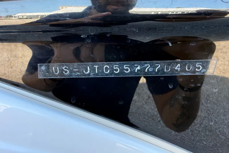 Slide: The Image of 2005 Crownline 275 CCR boat with visible hull identification number. - 20