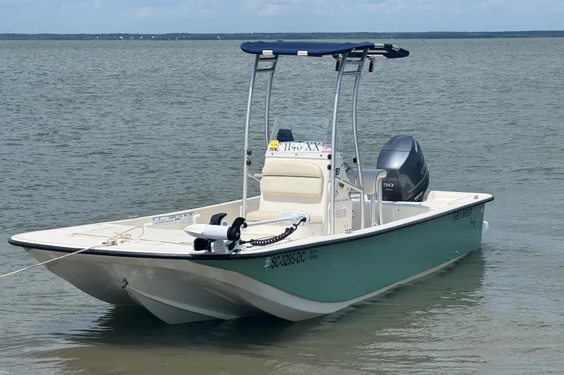 The Image of 2015 Key West 197 Skiff boat floating on calm water. - 1