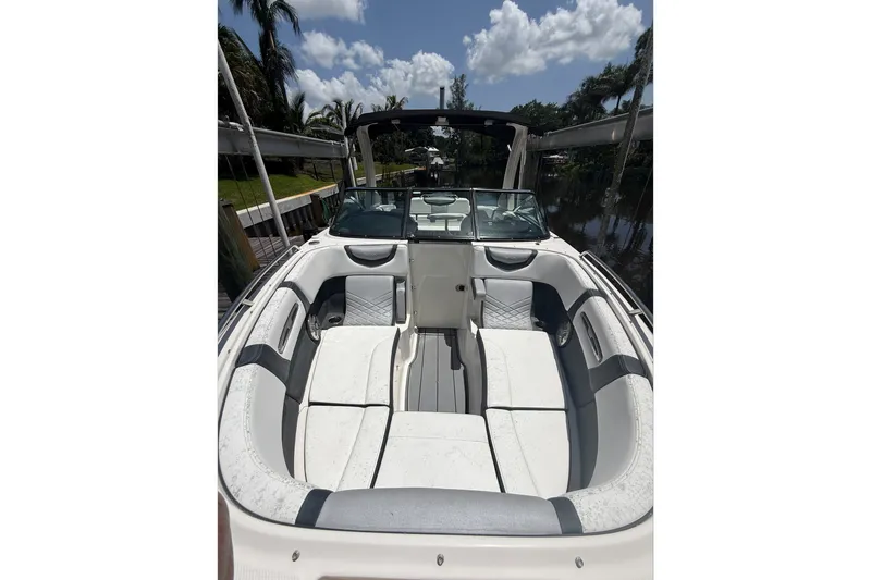 Slide: The Image of 2020 Chaparral 257 SSX boat interior with spacious seating and sleek design. - 7
