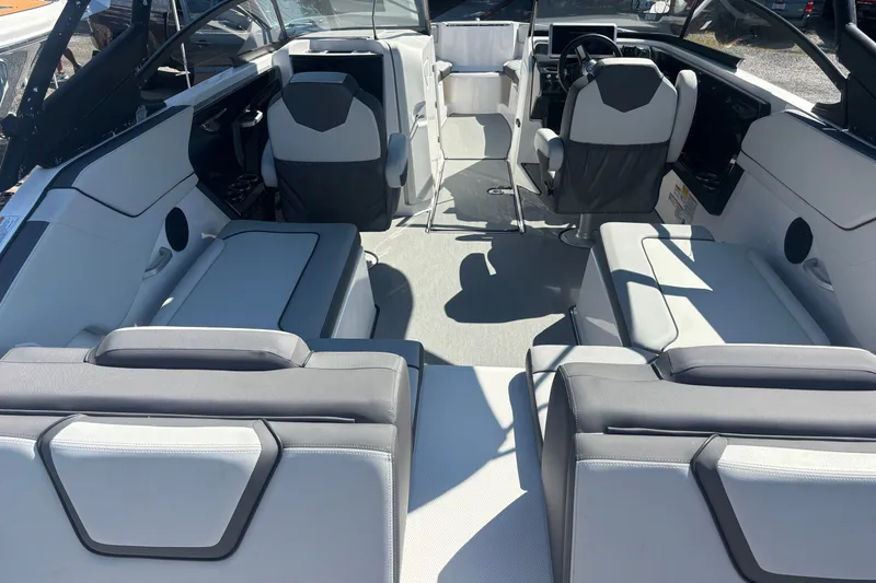 Slide: The Image of 2023 Yamaha Boats AR250 interior with modern seating and sleek design. - 6