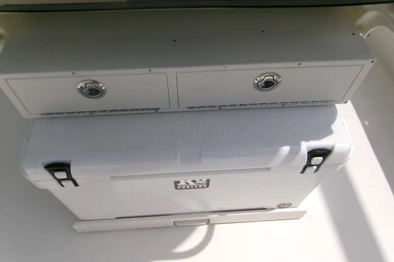 Slide: The Image of Storage compartment and cooler on 2026 Key West 239 FS boat. - 13