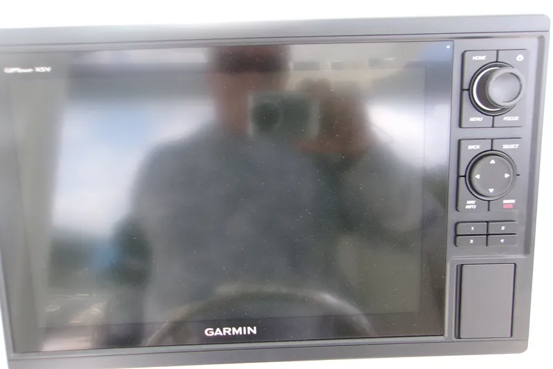 Slide: The Image of Garmin GPS display on 2026 Key West 239 FS boat dashboard. - 15