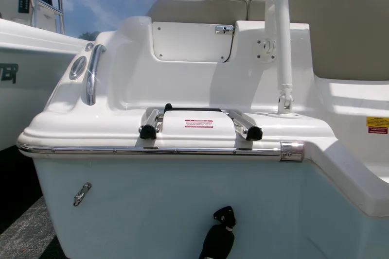 Slide: The Image of 2026 Key West 239 FS boat stern with ladder and railing details. - 4