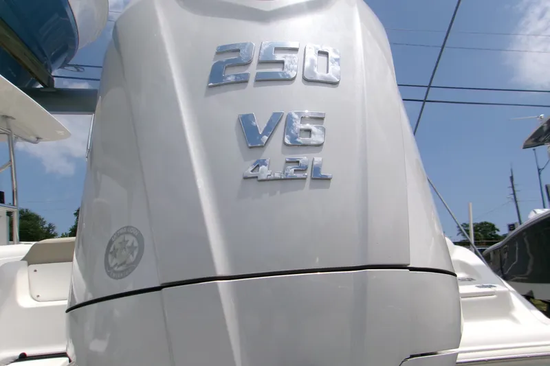 Slide: The Image of Outboard motor with "250 V6 4.2L" emblem on a 2026 Key West 239 FS boat. - 3