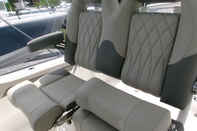 Slide: The Image of Luxurious seating on 2026 Key West 239 FS boat with diamond-stitched upholstery. - 7
