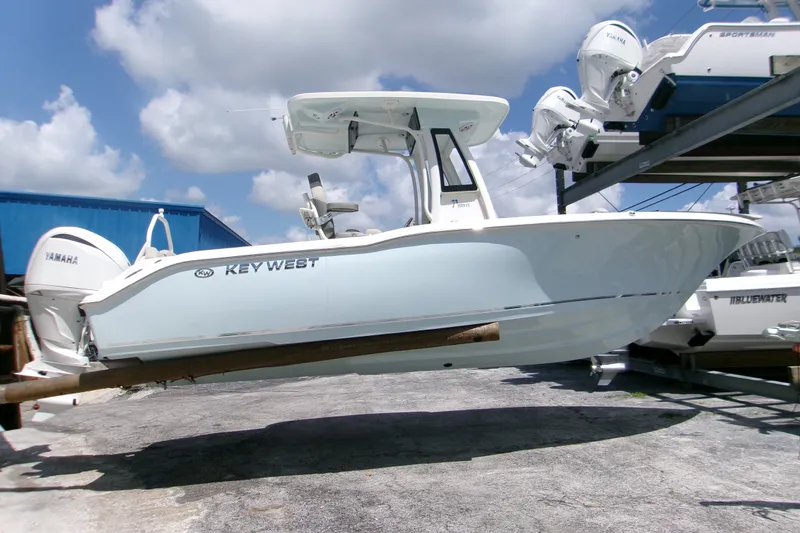 The Image of 2026 Key West 239 FS boat on display, featuring sleek design and Yamaha engine. - 1