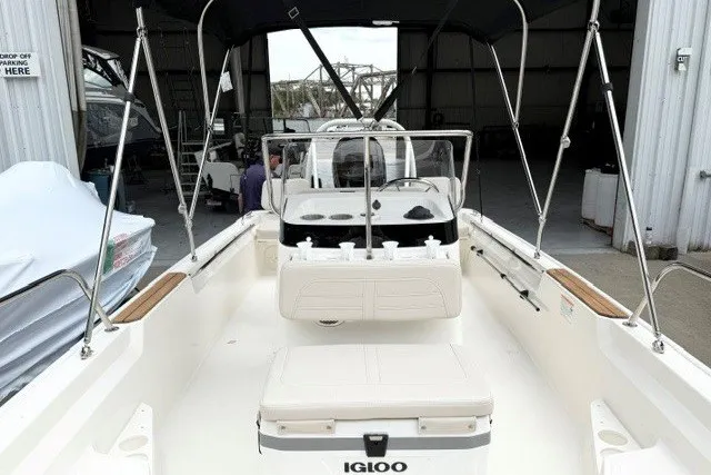 Slide: The Image of 2027 Boston Whaler 170 Montauk boat interior with seating and Igloo cooler. - 5