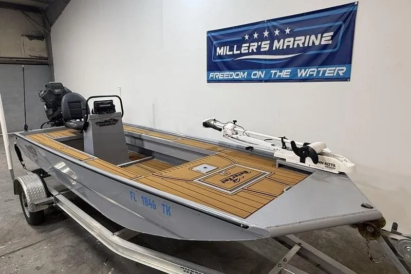 Slide: The Image of 2023 Gator Tail 1860 Extreme boat on trailer at Miller's Marine showroom. - 14