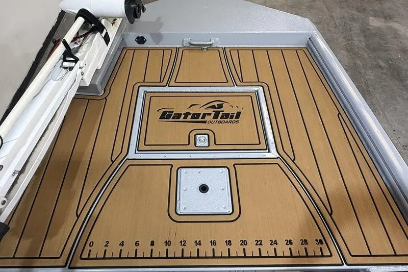 Slide: The Image of 2023 Gator Tail 1860 Extreme boat deck with logo and measurement markings. - 12