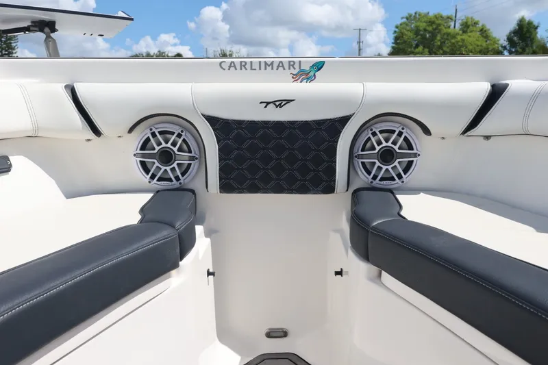 Slide: The Image of Interior of 2021 Tidewater 256 CC Adventure boat with speakers and seating. - 24