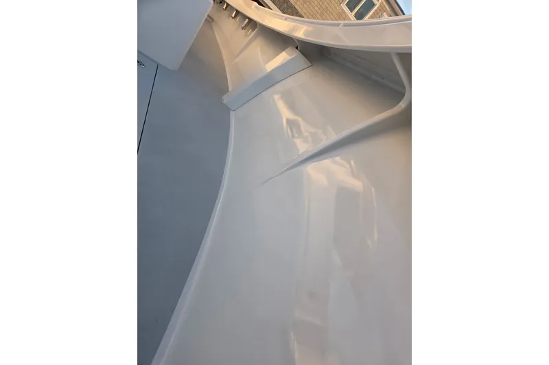Slide: The Image of 2022 Tidal Creeks Boatworks Center Console interior, showcasing sleek white design and craftsmanship. - 48