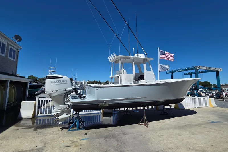 Slide: The Image of 2022 Tidal Creeks Boatworks Center Console with Suzuki engine on display at marina. - 25