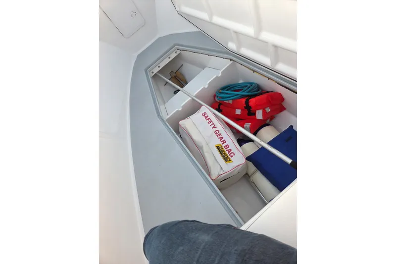 Slide: The Image of 2022 Tidal Creeks Boatworks Center Console storage with safety gear and life jackets. - 46