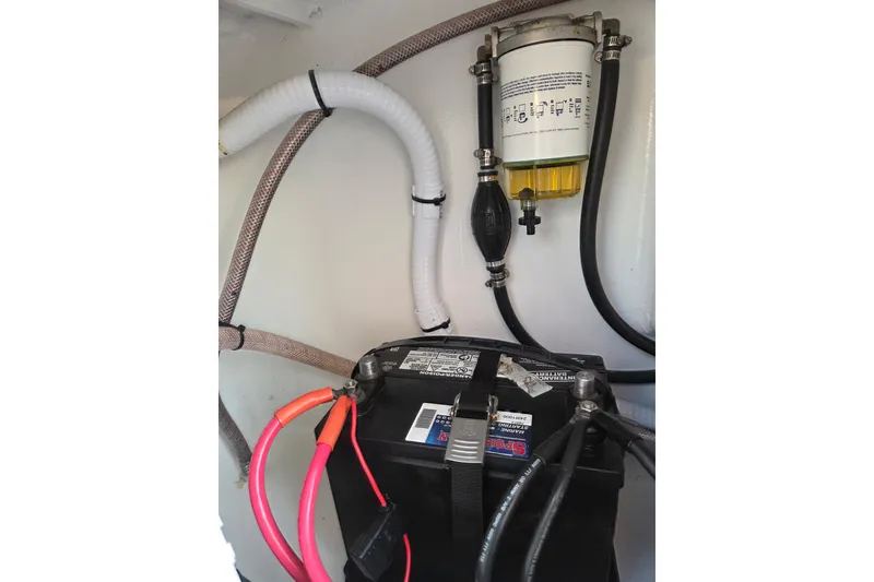Slide: The Image of Battery and fuel filter setup in 2022 Tidal Creeks Boatworks Center Console. - 34