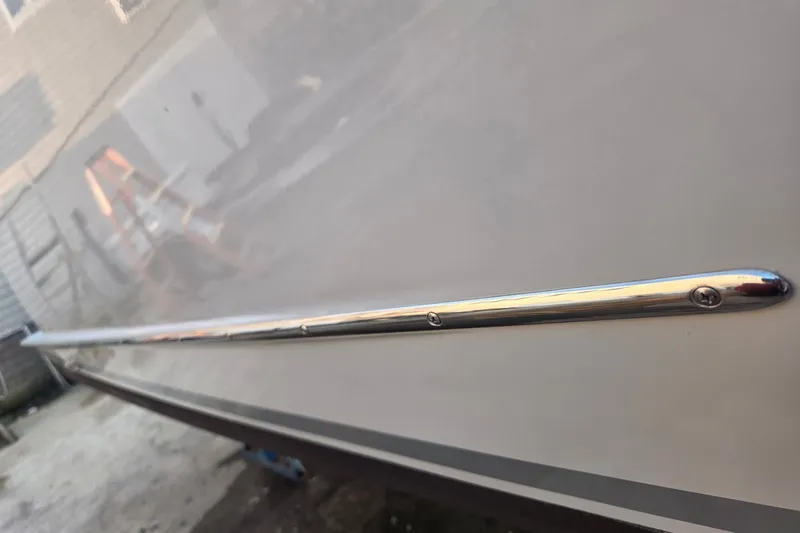Slide: The Image of Close-up of 2022 Tidal Creeks Boatworks Center Console hull detail. - 27