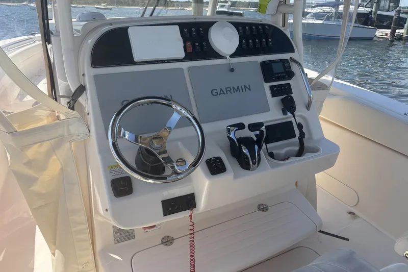 Slide: The Image of 2021 Grady-White Canyon 306 boat helm with Garmin navigation system. - 4